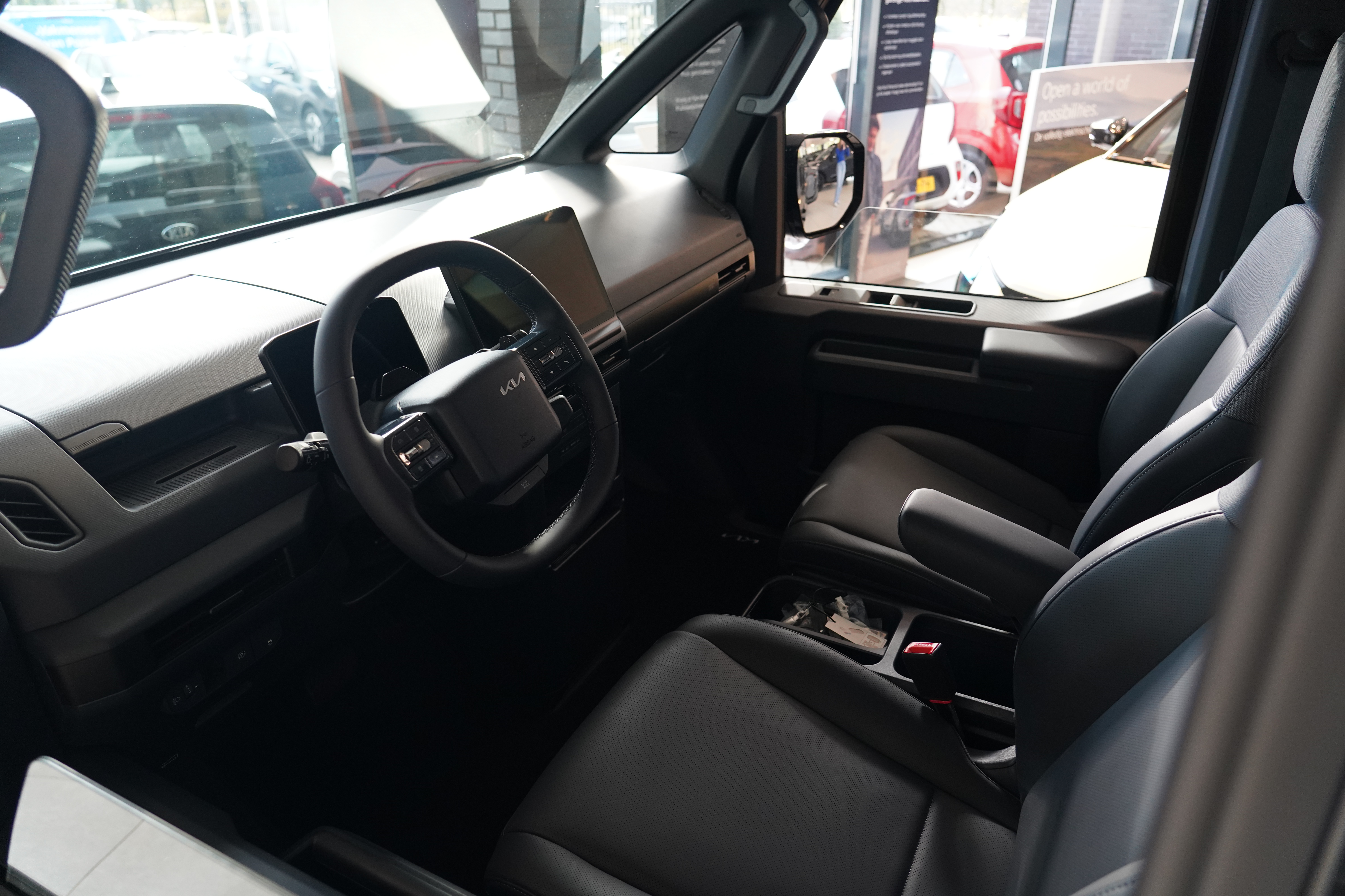 kia pv5 cargo interieur zitplaatsen voor